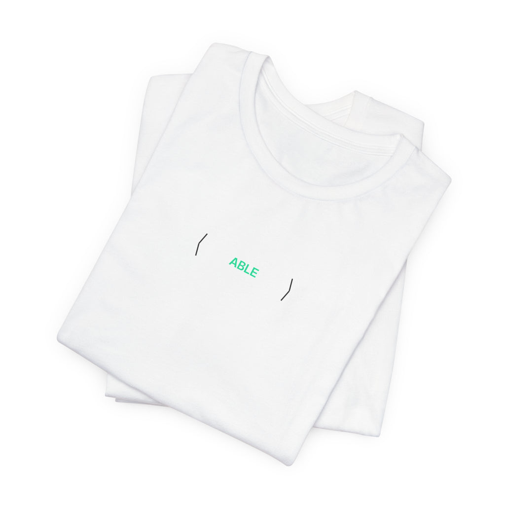 Folded white PREDICTABLE ABLE (Stealth) Unisex Tee showing the front graphic.