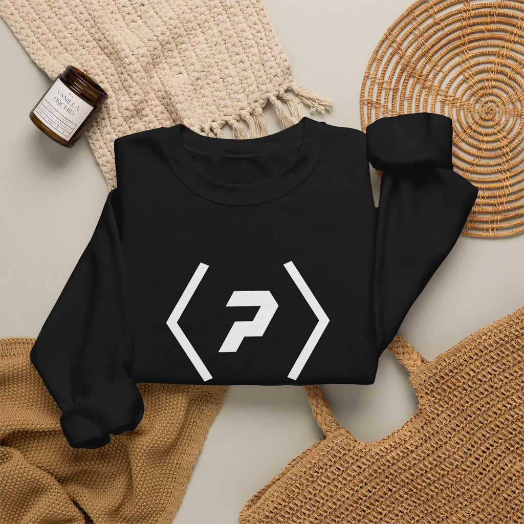 Folded black PREDICTABLE Wordmark Lockup Crewneck Sweatshirt arranged with neutral knit accessories.