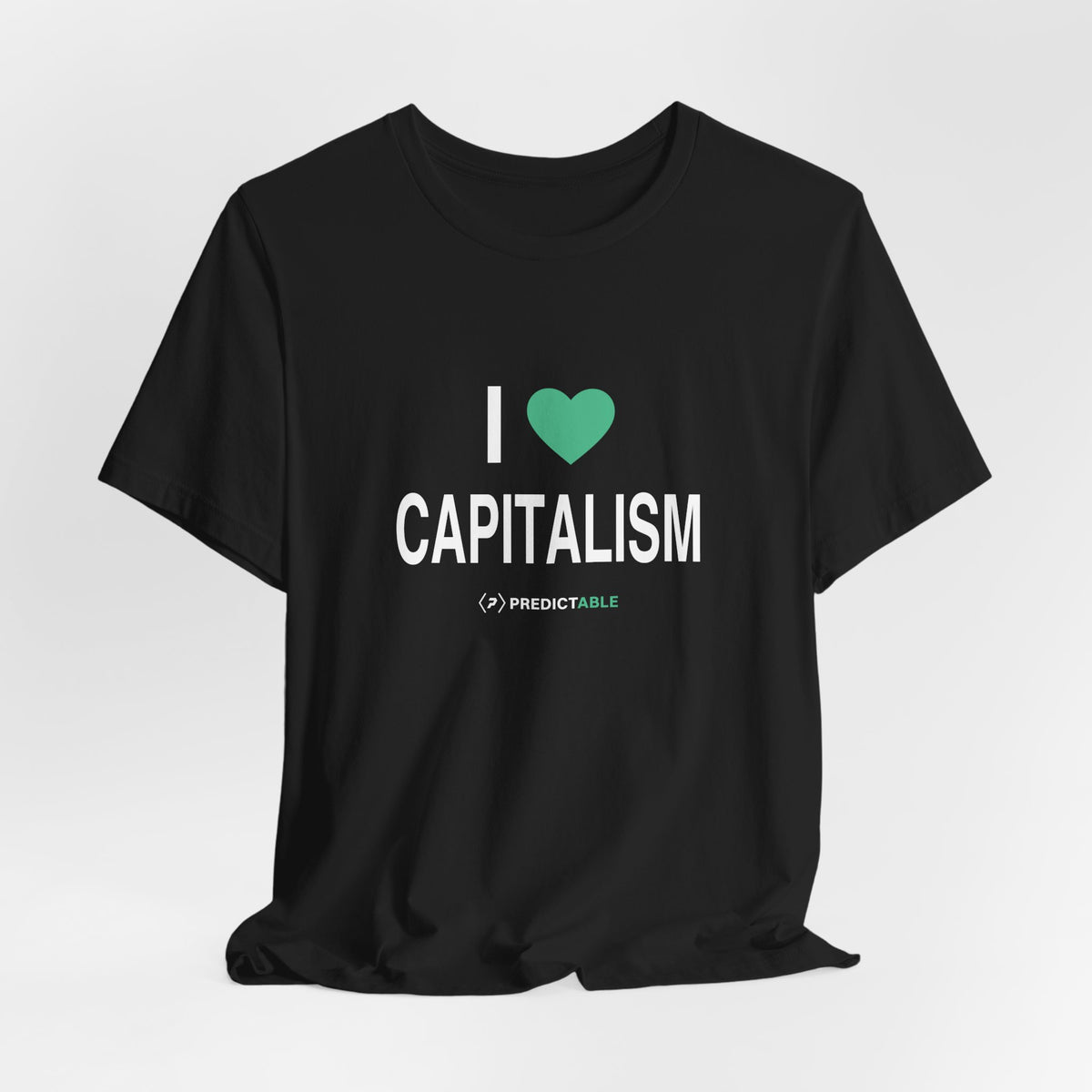 Black I Heart Capitalism T-shirt with mint heart, white lettering and PREDICTABLE wordmark, hanging front view