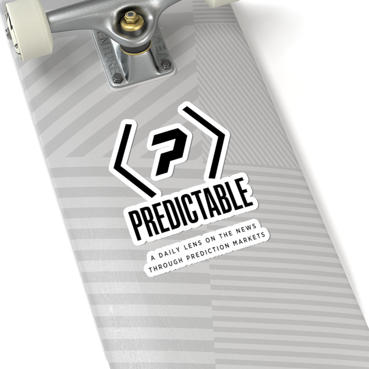 PREDICTABLE logo, wordmark and tagline sticker on the underside of a skateboard.