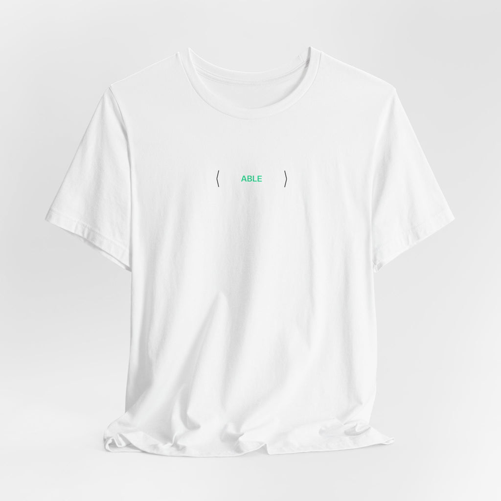 White PREDICTABLE ABLE (Stealth) Unisex Tee draped against a light gray backdrop.